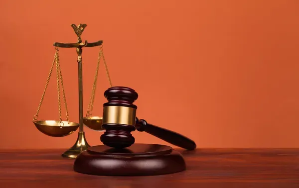 depositphotos_30923411-stock-photo-judge-gavel-and-scales-of